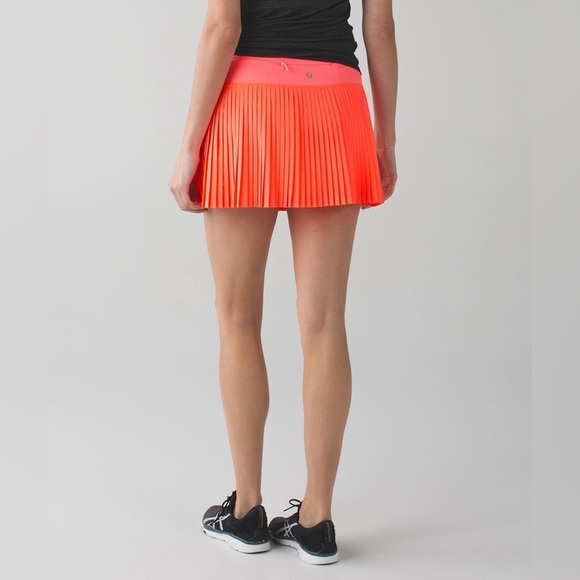 lululemon athletica Dresses & Skirts - Lululemon Pleat To Street Skirt II- Grapefruit- Size 8